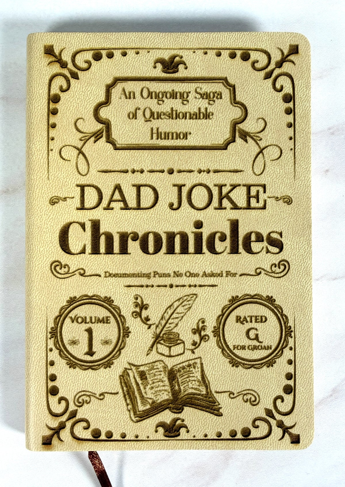 Close-up of laser engraved vintage design on PU leatherette journal cover